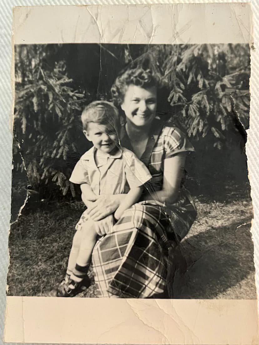 Damaged family photo before restoration